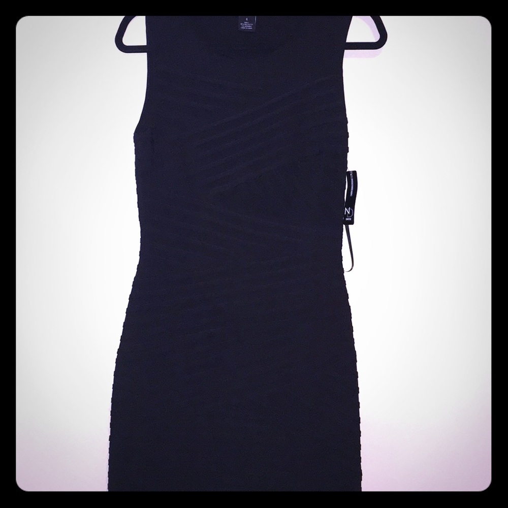 Black bandage dress.